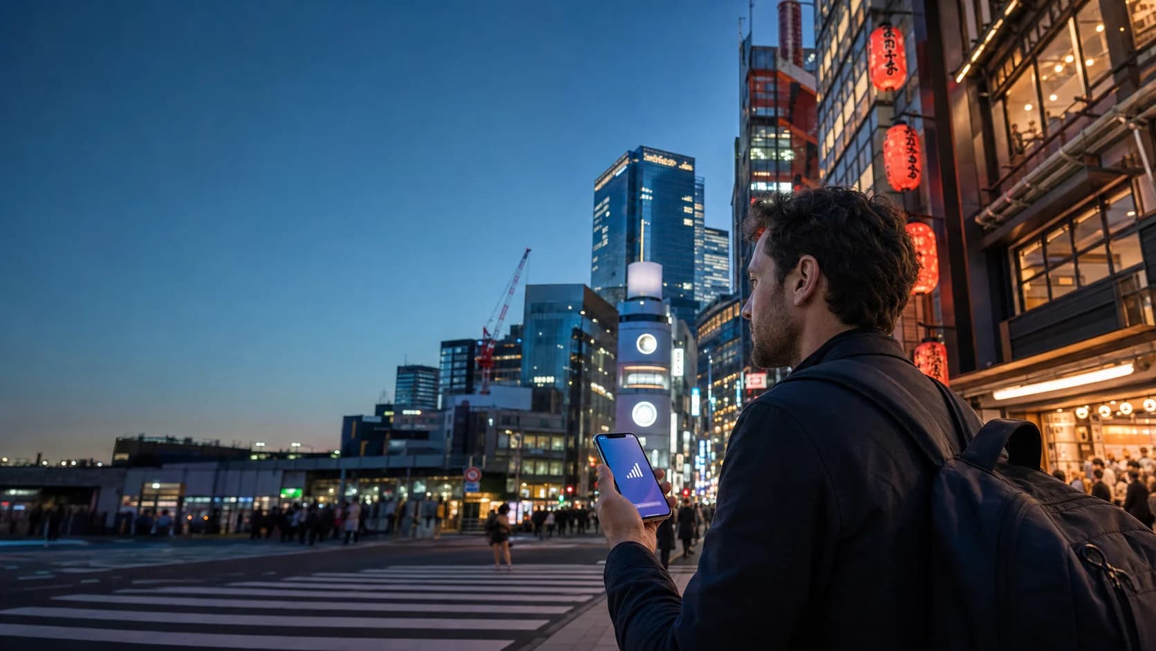 Traveler checking mobile data while walking through Tokyo